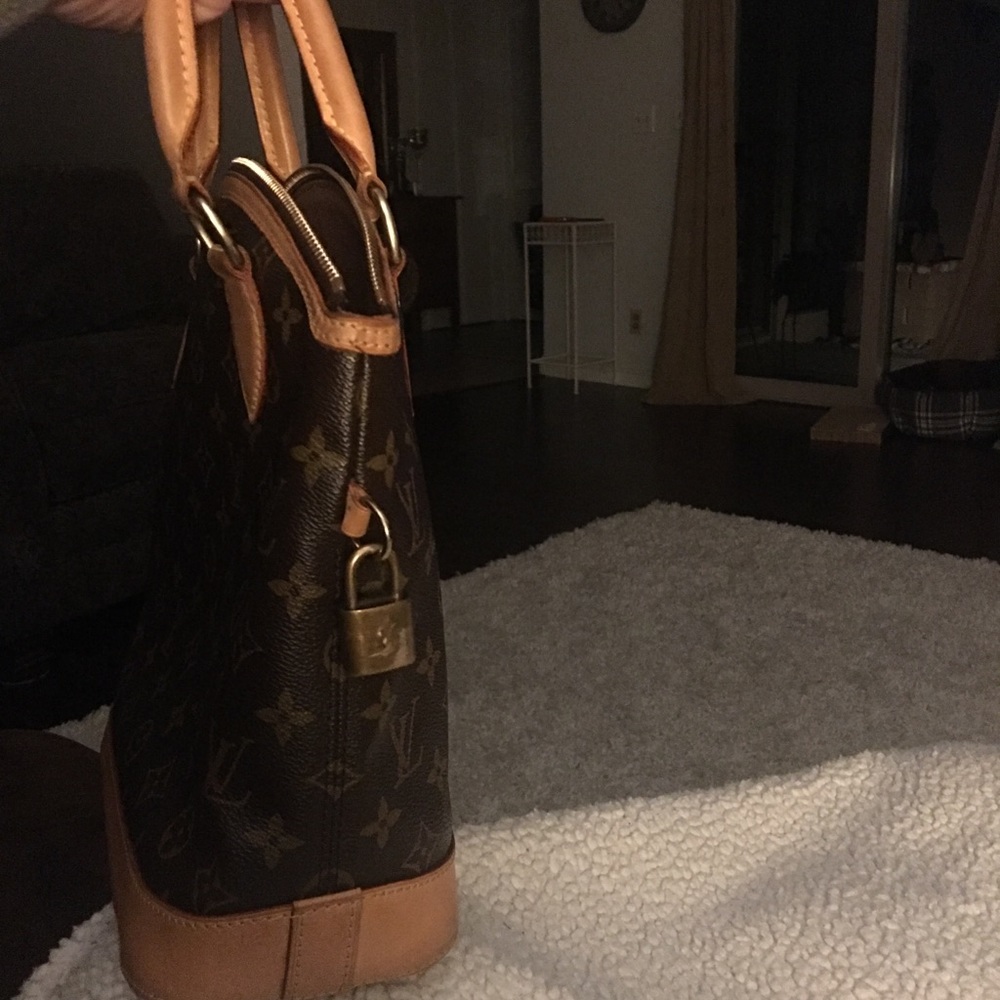 Authentic Lois Vuitton